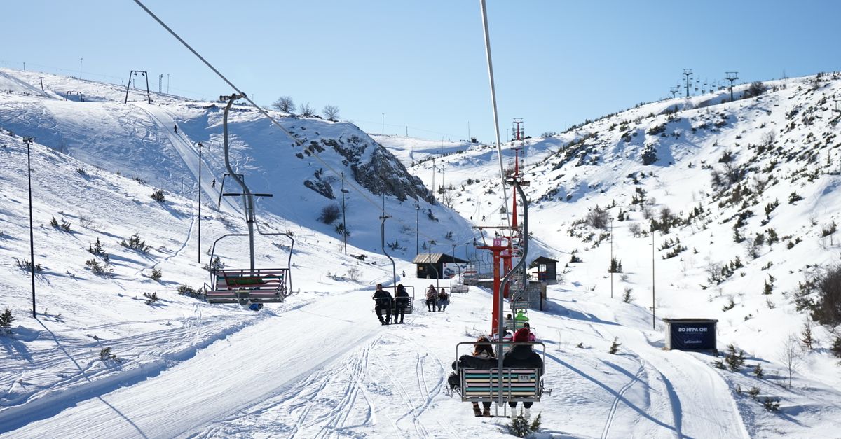 Snow-covered mountains with a ski lift in Mavrovo, North Macedonia. Perfect winter adventure.