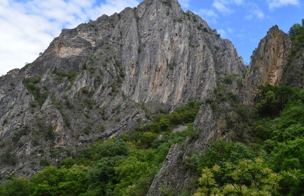 Explore the stunning rocky cliffs and lush greenery of Matka Canyon in Skopje, North Macedonia.