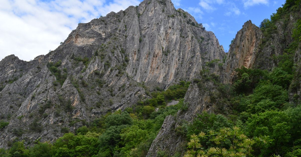 Explore the stunning rocky cliffs and lush greenery of Matka Canyon in Skopje, North Macedonia.